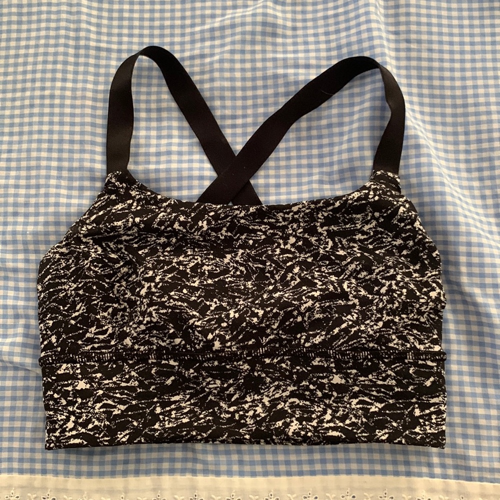 Lululemon strappy sports bra. Very supportive. Size 4